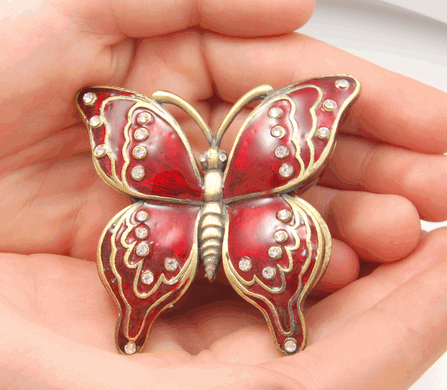 Red Butterfly Cremation Keepsake shown in hands